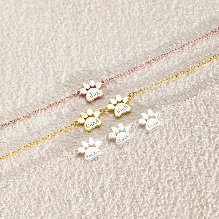 Cadeau personnalisé femme : bracelet PawEmbrace en acier inoxydable gravé, idéal pour les propriétaires d'animaux.
