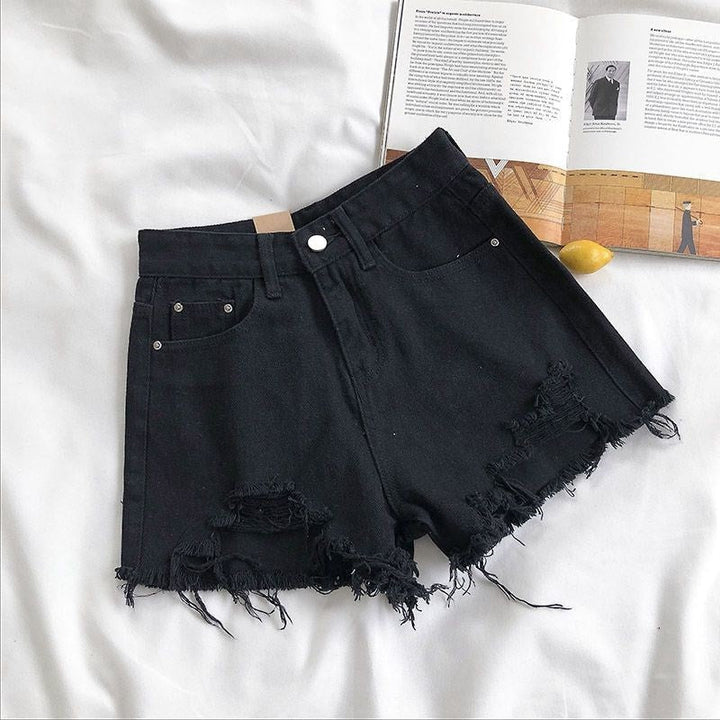 Short jean femme taille haute, coupe large. Effet usé stylé, idéal pour une silhouette décontractée été.