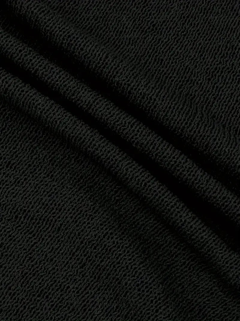 Robe d'été femme, mini, élégante. Dos nu et bretelles fines pour un style tendance.