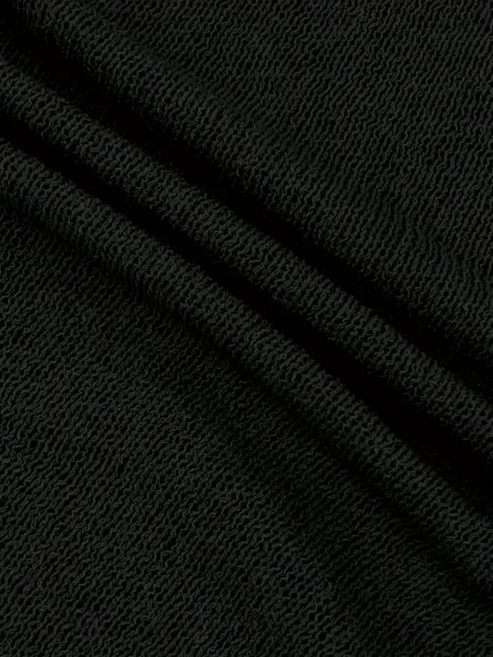 Robe d'été femme, mini, élégante. Dos nu et bretelles fines pour un style tendance.