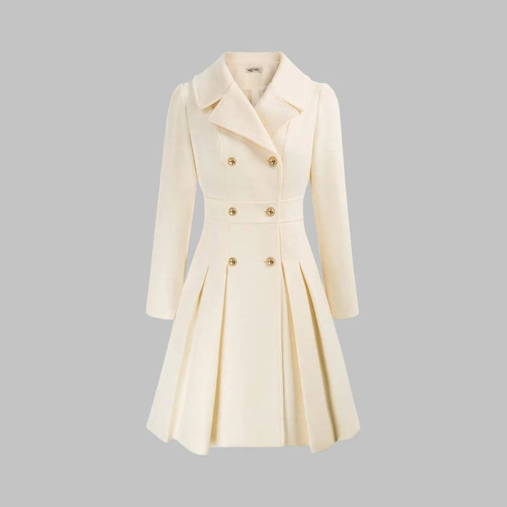 Manteau femme chic coupe A-ligne, double boutonnage. Plissé élégant, idéal pour un look hiver mode et féminin.