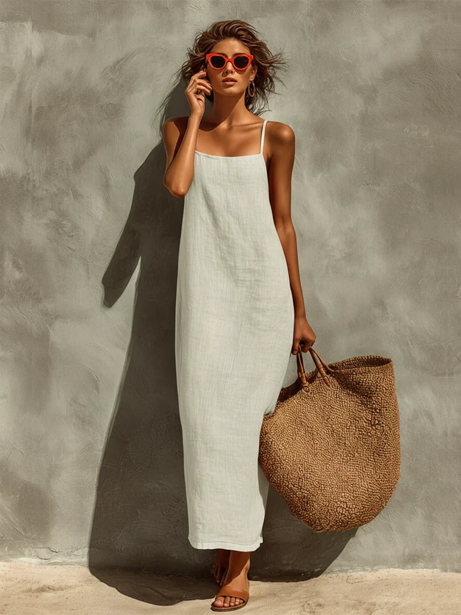 Robe longue femme élégante et décontractée. Coupe ample, encolure carrée, idéale pour le printemps-été.