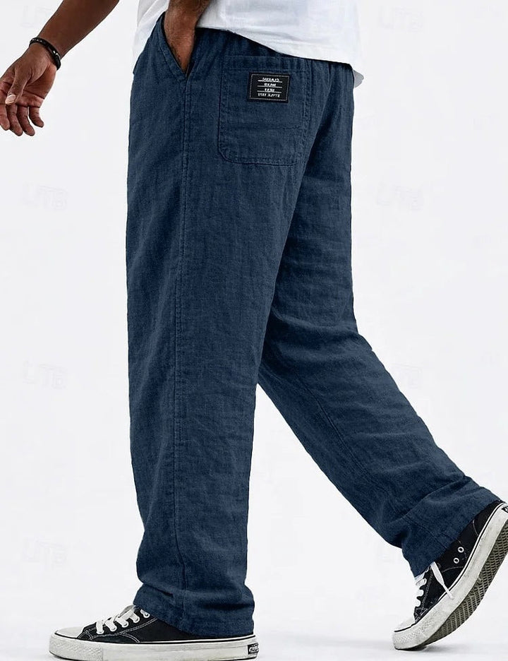 Pantalon large homme ultra confortable, coupe ample et décontractée, avec taille cordon, idéal pour l'été.