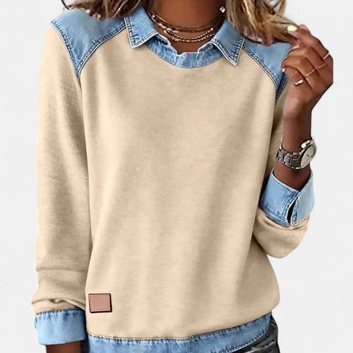 Pull femme décontracté-chic, col chemise moderne, idéal pour les journées d'hiver fraîches.