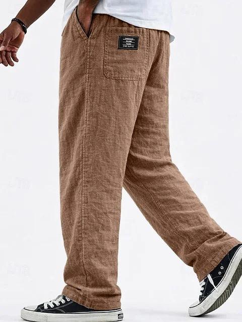 Pantalon homme ample décontracté, coupe large et tissu léger, offrant un confort maximal pour l'été.