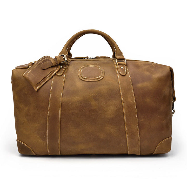 Duffel homme moderne-vintage en cuir marron, sac de voyage grande capacité pour l'explorateur.