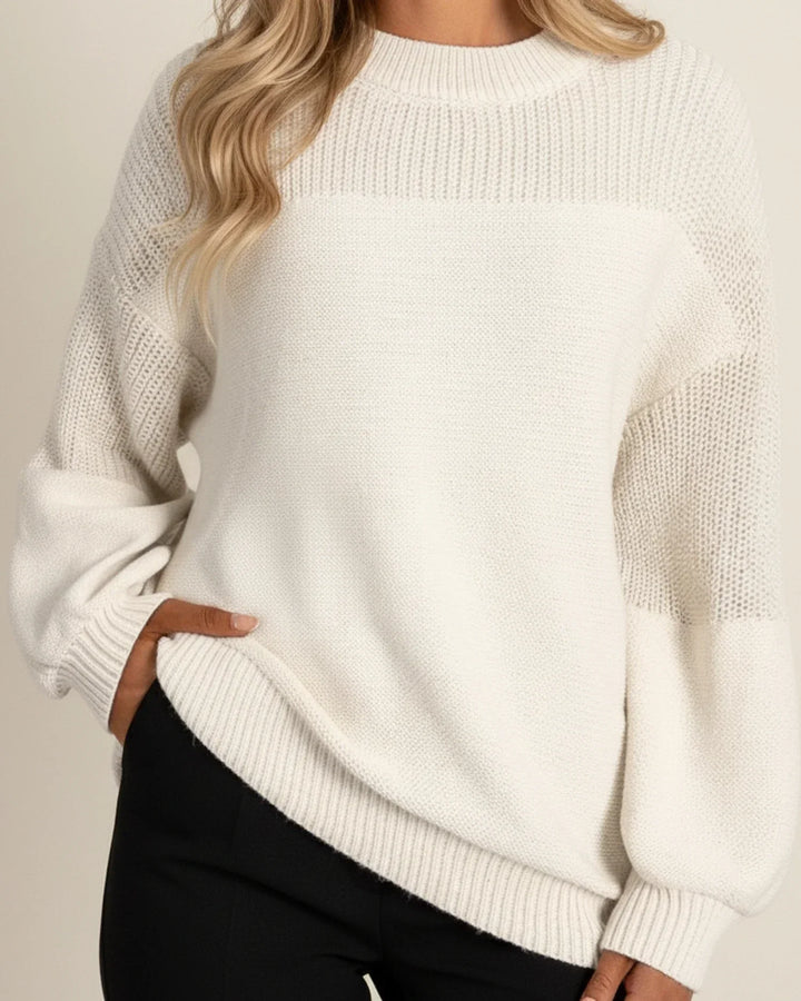 Pull femme chic à manches lanternes et fleurs crochetées. Idéal automne/hiver, confortable et élégant.