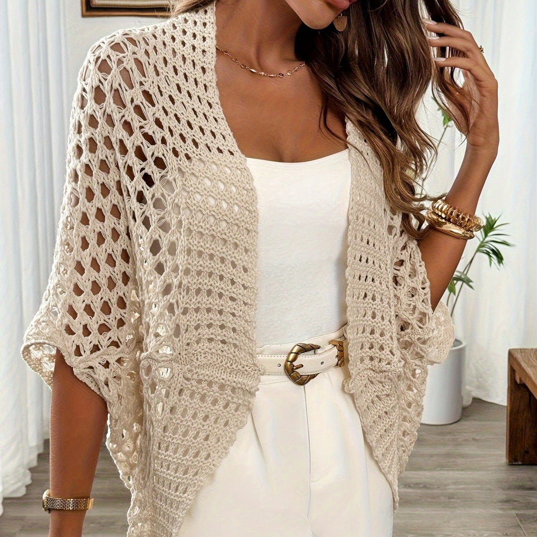 Cardigan femme léger, parfait pour superposition élégante. Manches longues, idéal printemps/automne chic et confortable.