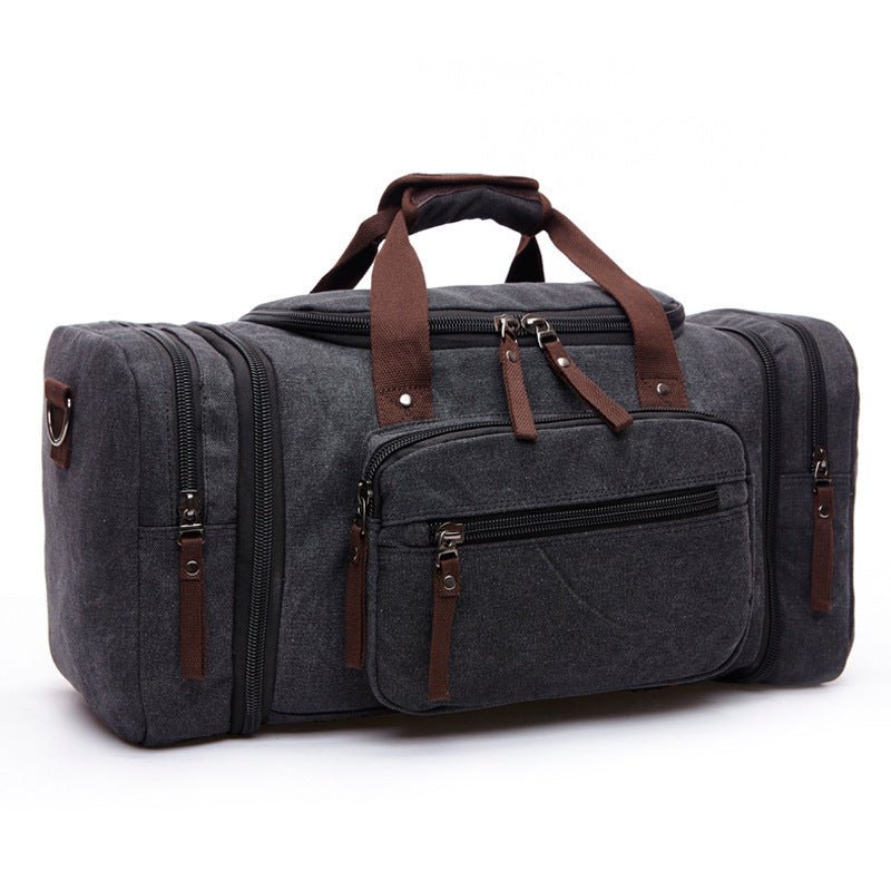 Sac de voyage homme stylé et grand format, en toile résistante, accessoire essentiel pour vos déplacements.