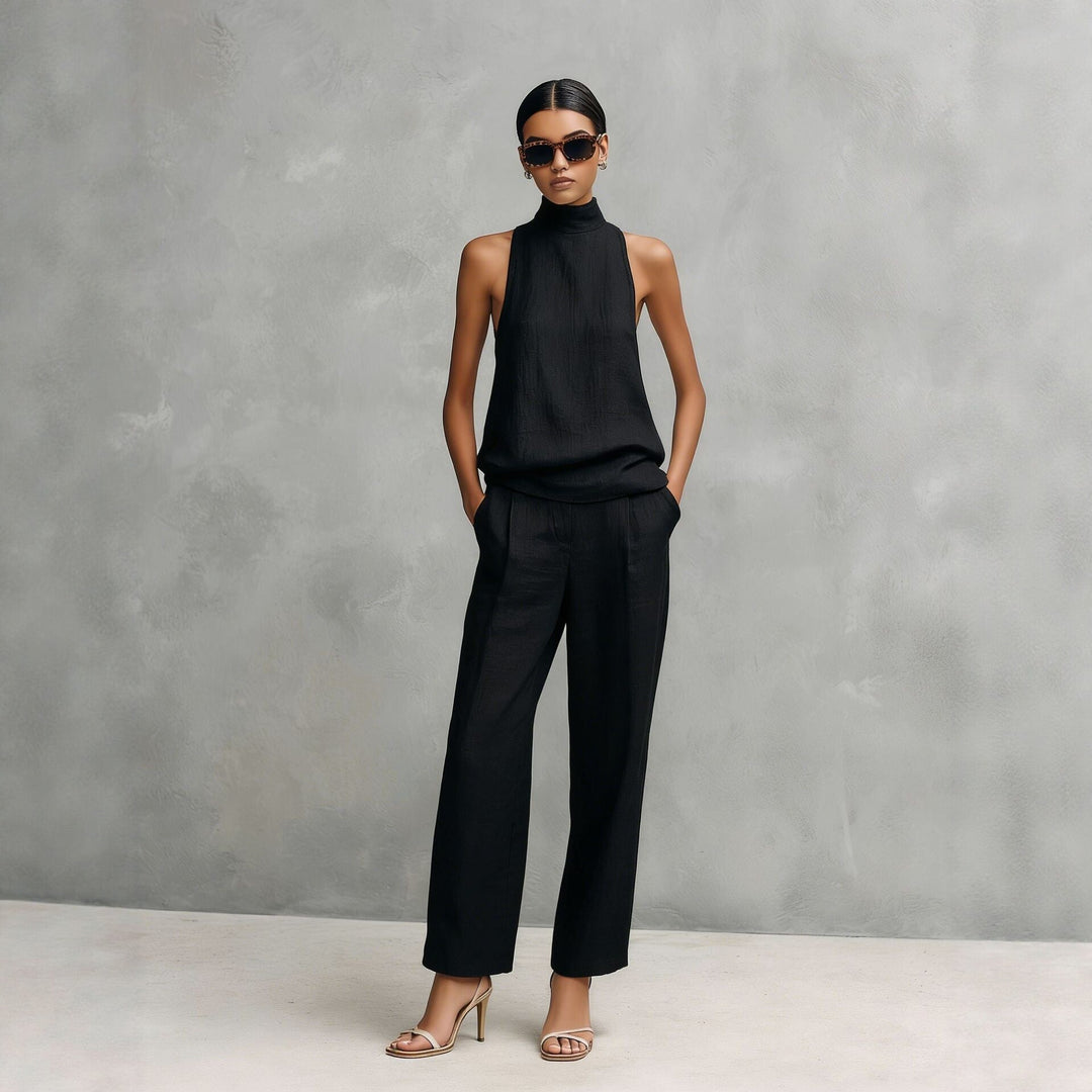 Ensemble femme élégant deux pièces : top col montant sans manches et pantalon large fluide. Idéal printemps-été.