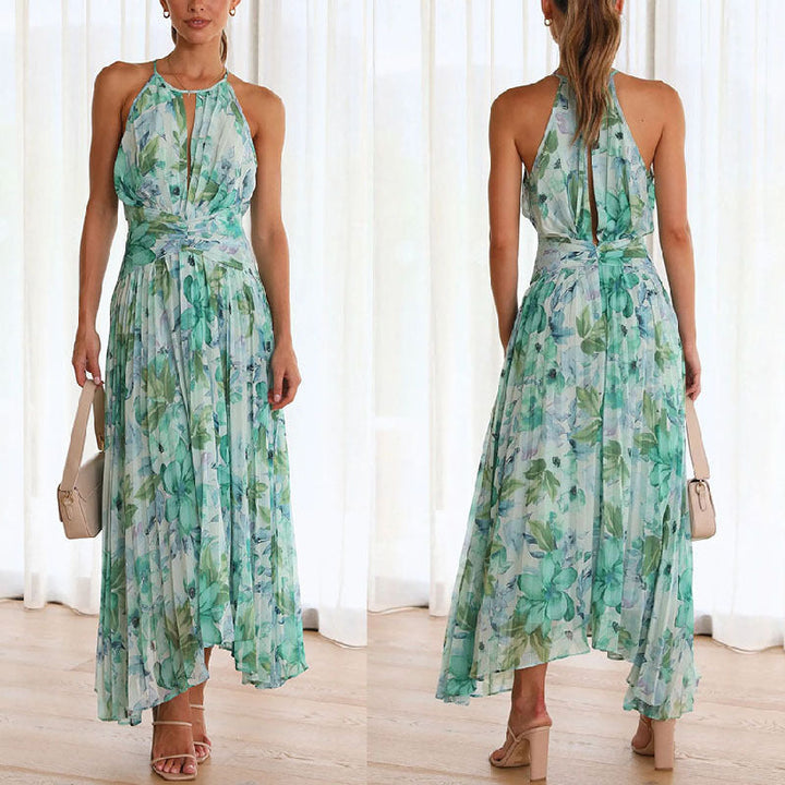 Robe femme midi imprimée avec col halter et encolure en V, style fluide sans manches. Chic été et confortable.