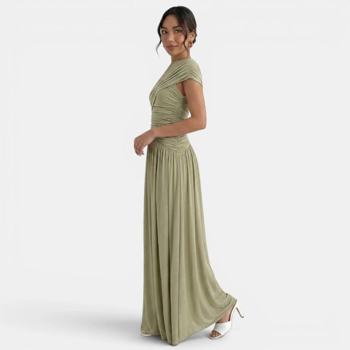 Robe longue femme bodycon plissée, élégante taille haute asymétrique, couleur sophistiquée.