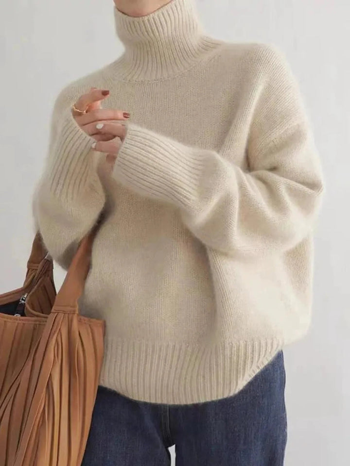 Pull femme maille tricot épaisse, col roulé, apporte chaleur et style décontracté chic pour l'hiver.