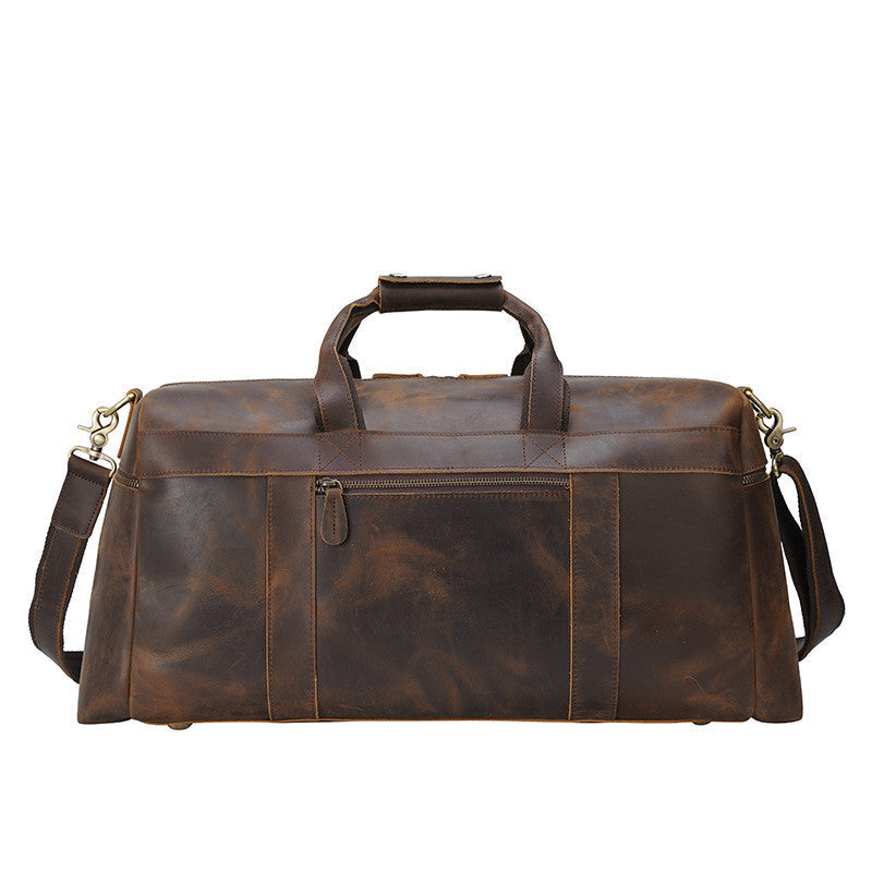 Élégant sac cabas vintage en cuir marron pour homme, parfait pour le quotidien et les voyages.