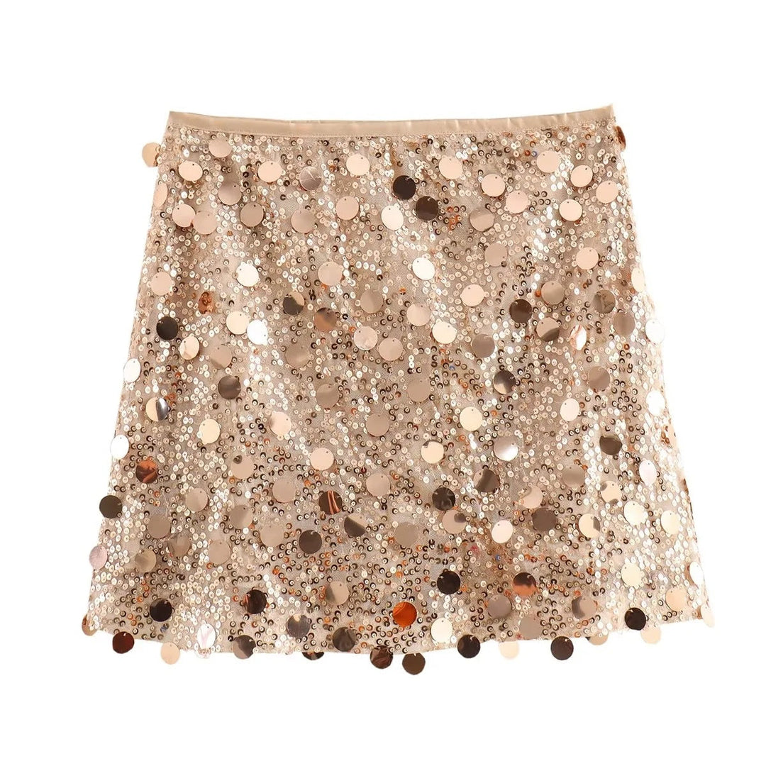 Jupe de fête femme à sequins, coupe mini et style chic. Idéale pour briller en toute occasion.