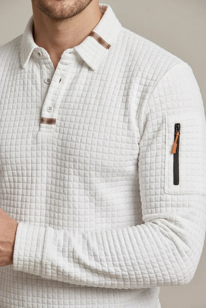 Haut polo homme à manches longues, design damier moderne et polyvalent. Idéal pour toute saison.
