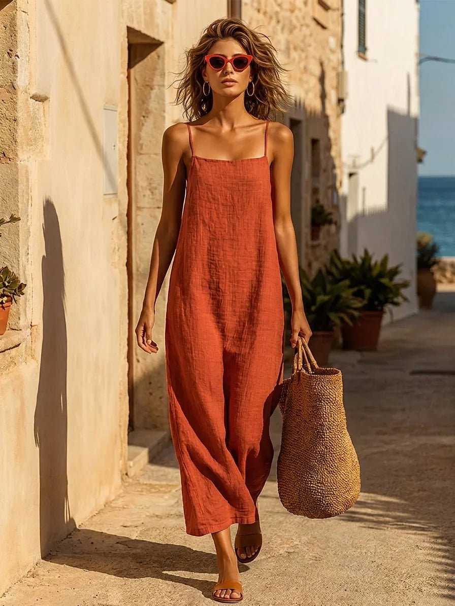 Maxi robe femme fluide sans manches avec encolure carrée. Chic et confortable pour le printemps et l'été.