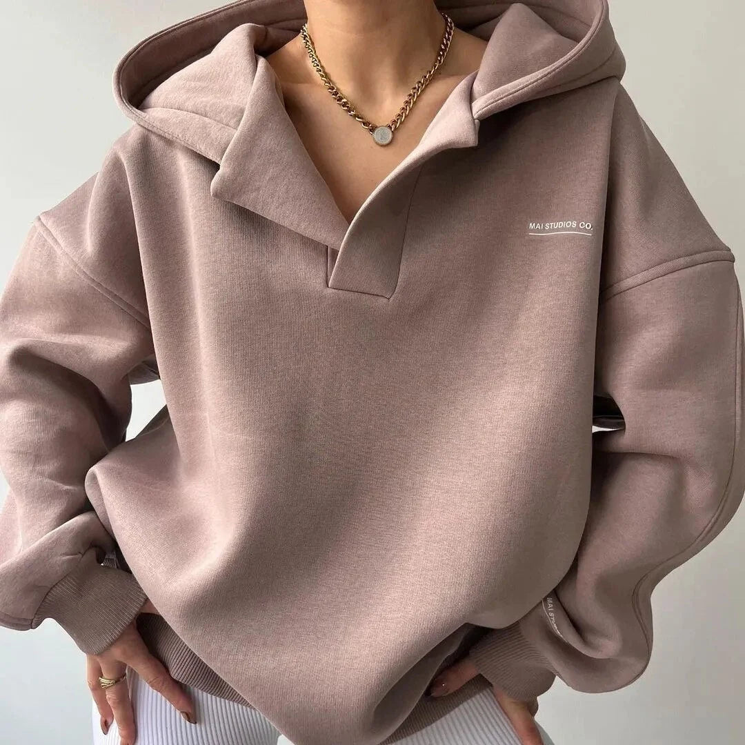 Sweat à capuche femme oversize décontracté, style mode ample pour l'automne-hiver. Confortable et douillet.