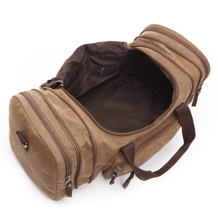 Accessoire homme : sac de voyage grand format en toile robuste, idéal pour un weekend ou une courte aventure.