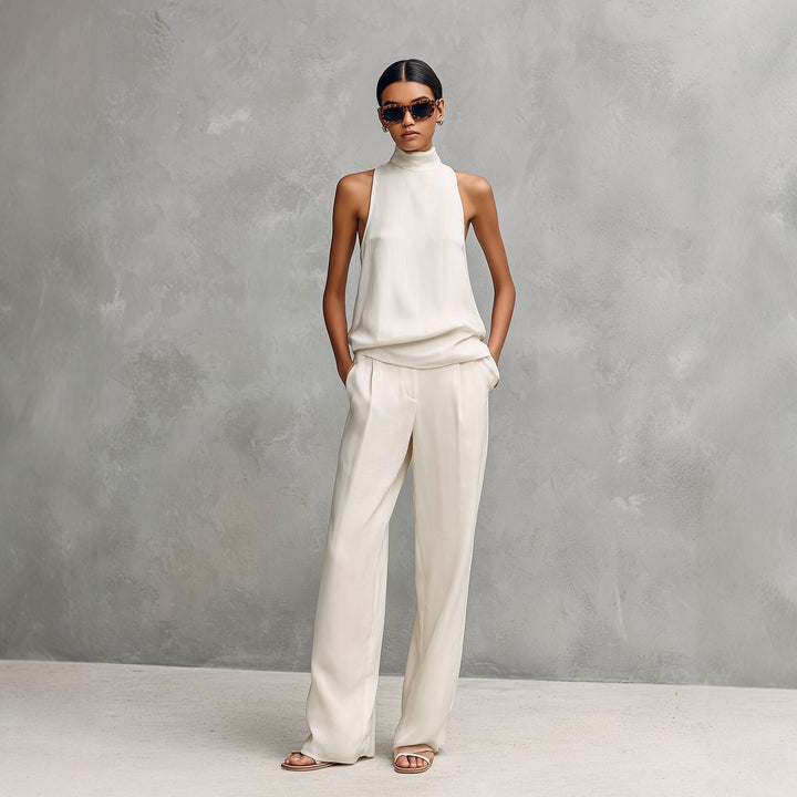 Mode femme : ensemble deux pièces chic avec top col montant et pantalon large fluide. Tenue polyvalente printemps été.