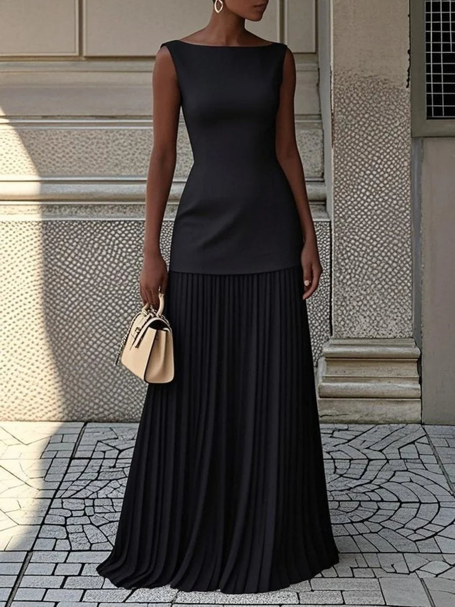 Superbe robe femme sans manches, coupe ajustée et élégante. Parfaite pour mettre en valeur votre silhouette estivale.