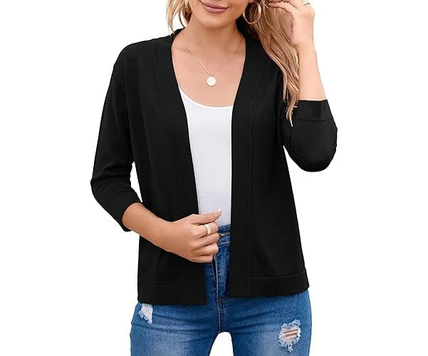 Cardigan femme chic et tendance, coupe courte ouverte. Parfait pour rehausser votre mode automne-hiver avec légèreté.