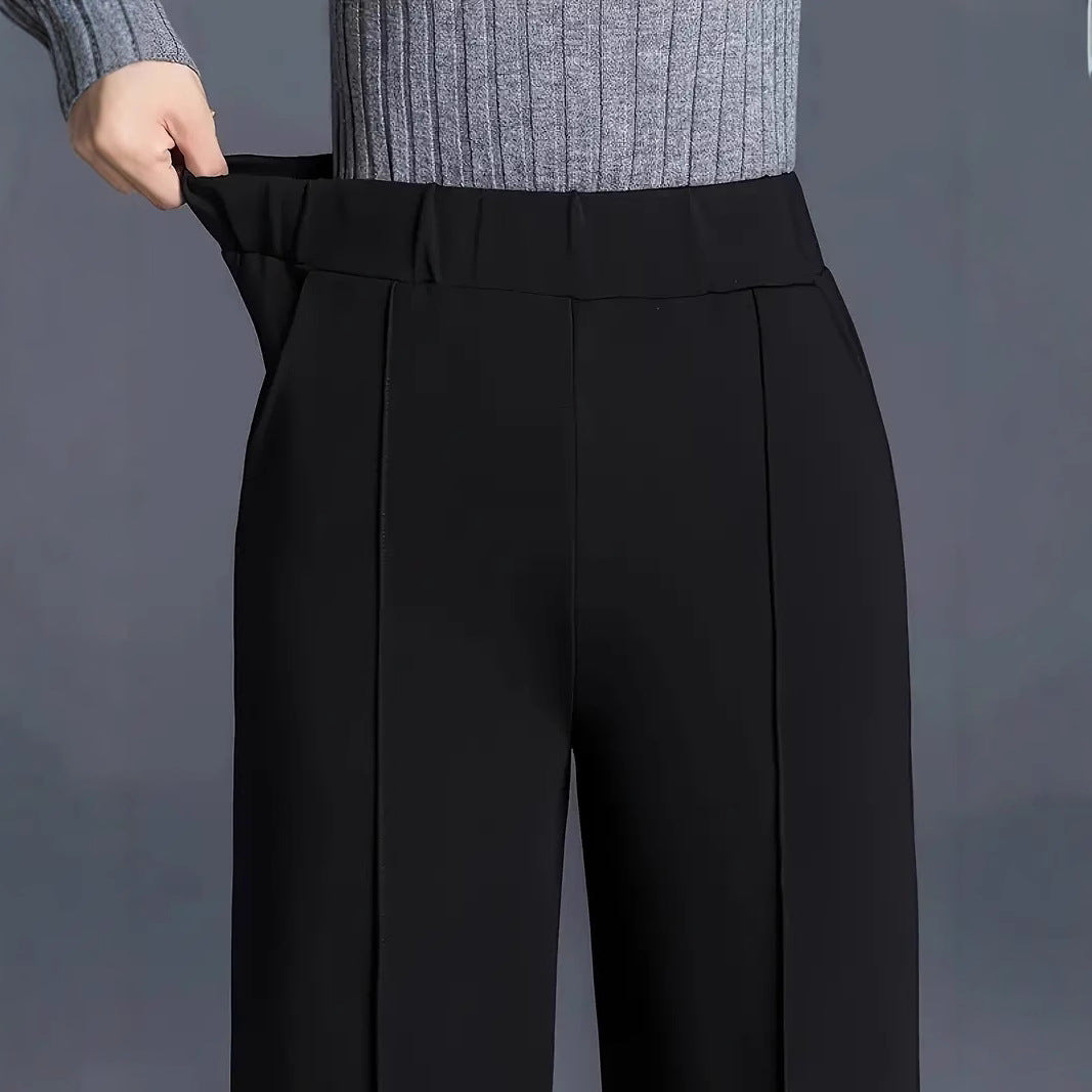 Vêtement femme polyvalent: pantalon élégant à coupe droite, alliant style moderne et confort optimal.