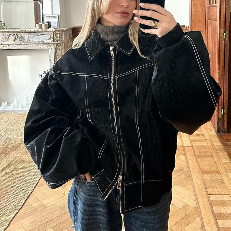 Veste motard femme chic, coupe loose & col zippé. Tendance mode urbaine automne-hiver.