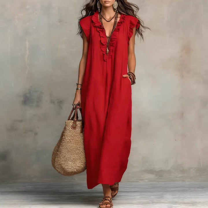 Vêtement femme: Robe maxi sans manches fluide, élégante, avec volants et poches. Idéale pour le printemps/été.
