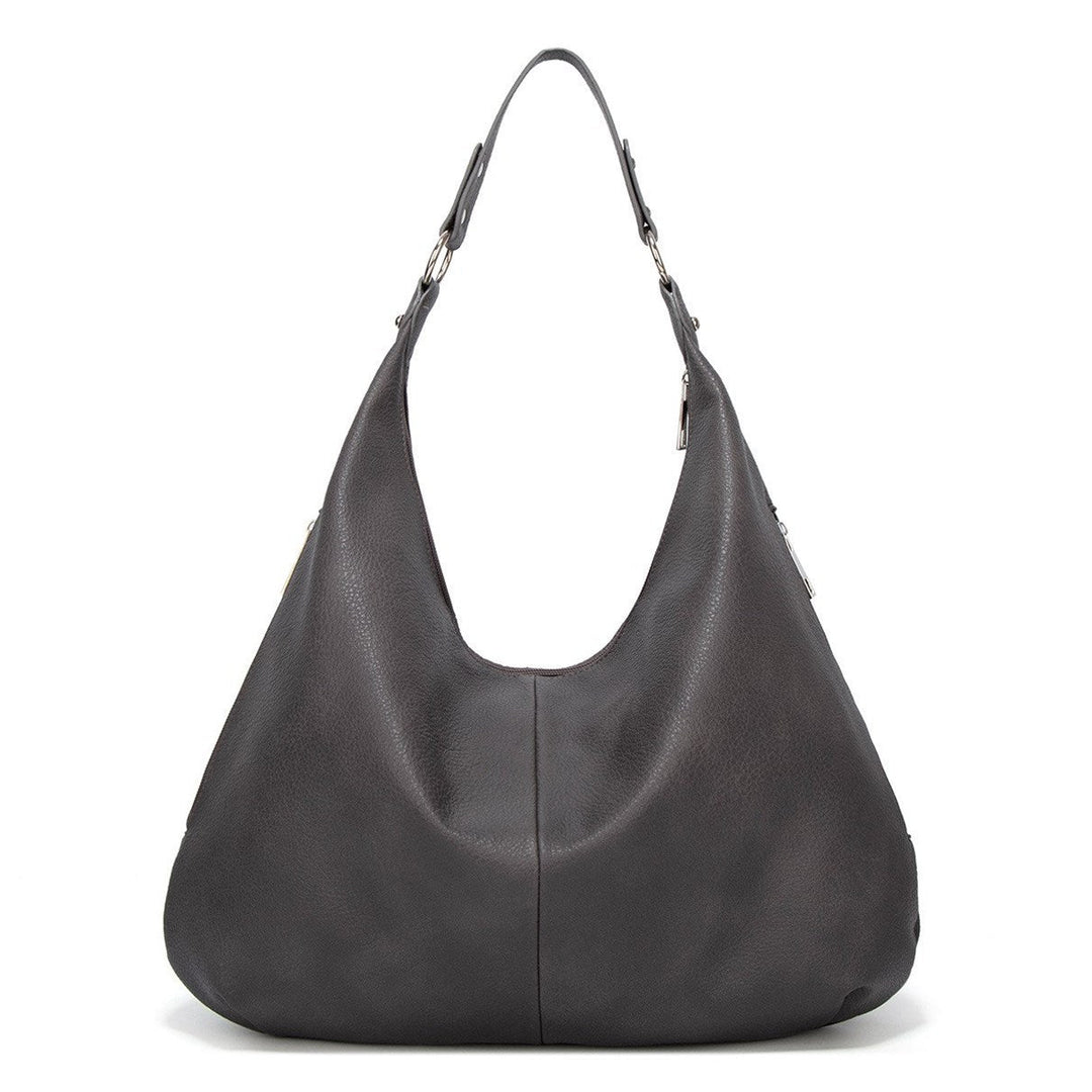 Sac cabas femme pratique et polyvalent, idéal pour le quotidien. Porté épaule, élégant et léger.