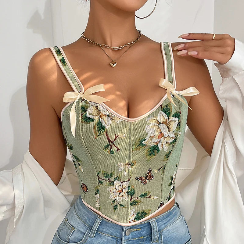 Gilet femme fleuri cintrée, bretelles à nouer, col cœur. Tissu léger, motif floral, mode été chic.