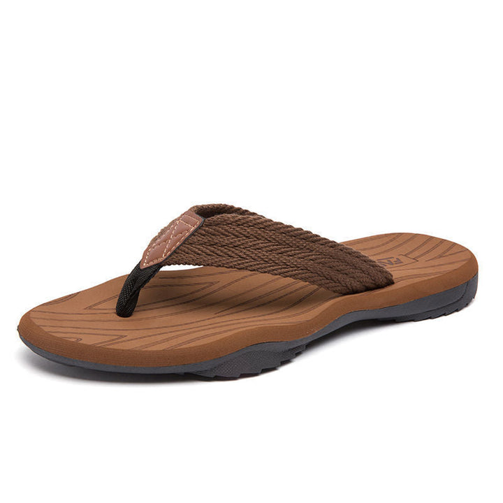 Tongs homme antidérapantes grises, ultra-confortables, style décontracté pour les vacances et les journées d'été.