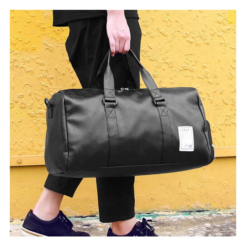 Sac de voyage homme élégant, noir, parfait pour le sport et la gym. Grand volume, pratique pour tous vos accessoires.