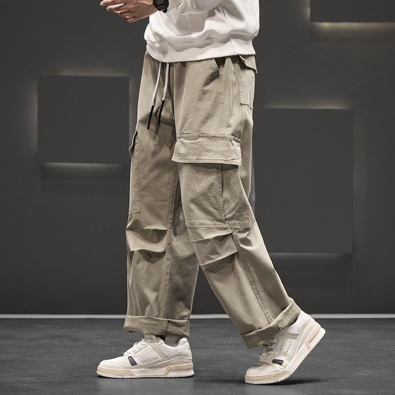 Pantalon cargo homme, taille élastique et coupe large ultra confortable. Vêtement décontracté, mode masculine moderne.