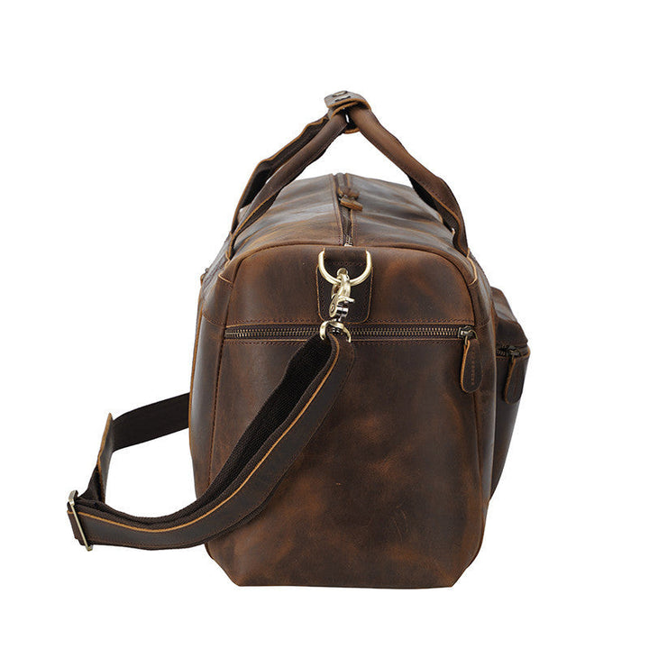 Grand sac cabas homme en cuir marron vintage, accessoire pratique avec grande capacité de rangement.
