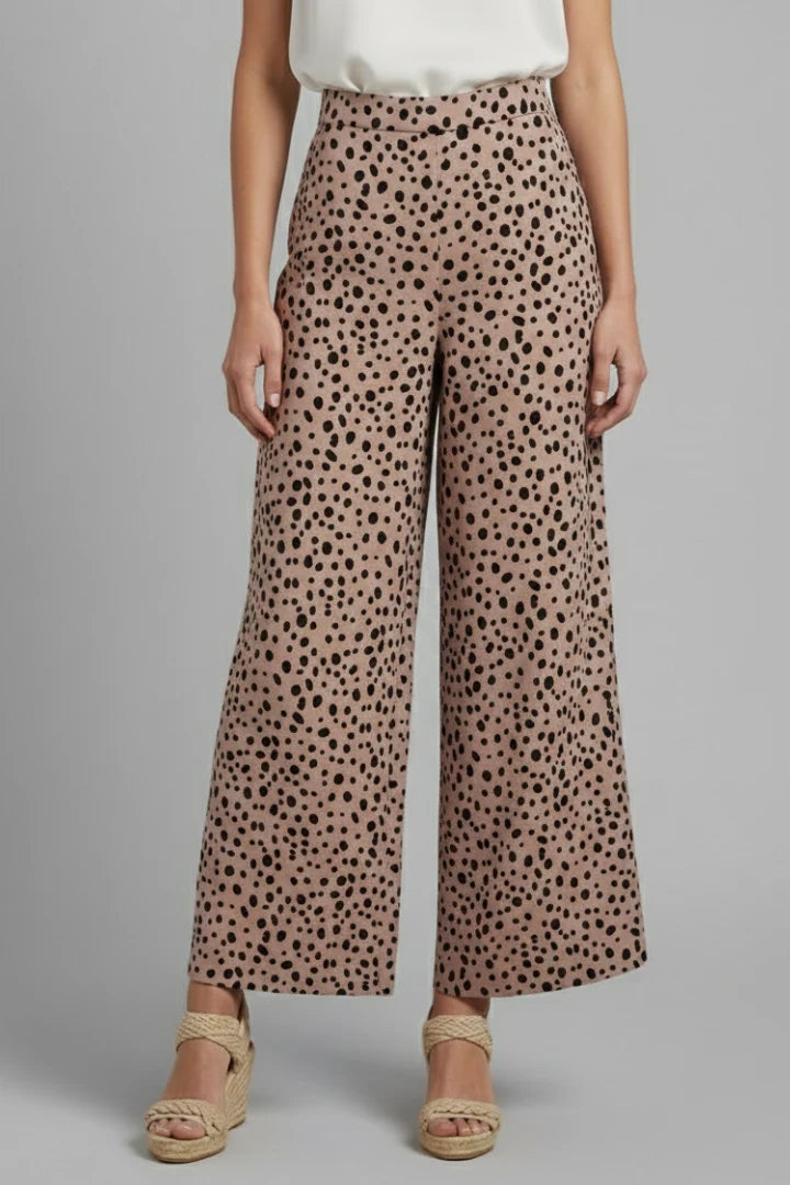 Pantalon large femme taille haute vert léopard. Look fluide et élégant en polyester pour un style mode.