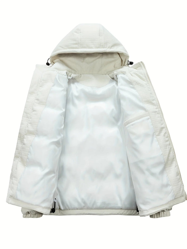 Veste d'hiver homme kaki, matelassée et dotée d'une capuche, alliant confort, chaleur et look urbain.