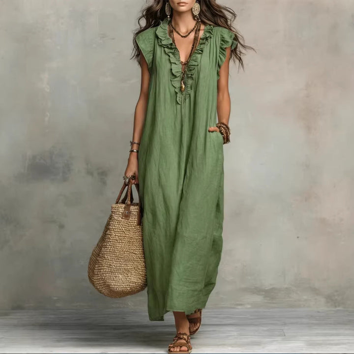 Robe maxi femme fluide et confortable, sans manches, avec volants décoratifs et poches. Parfaite pour la mode estivale.