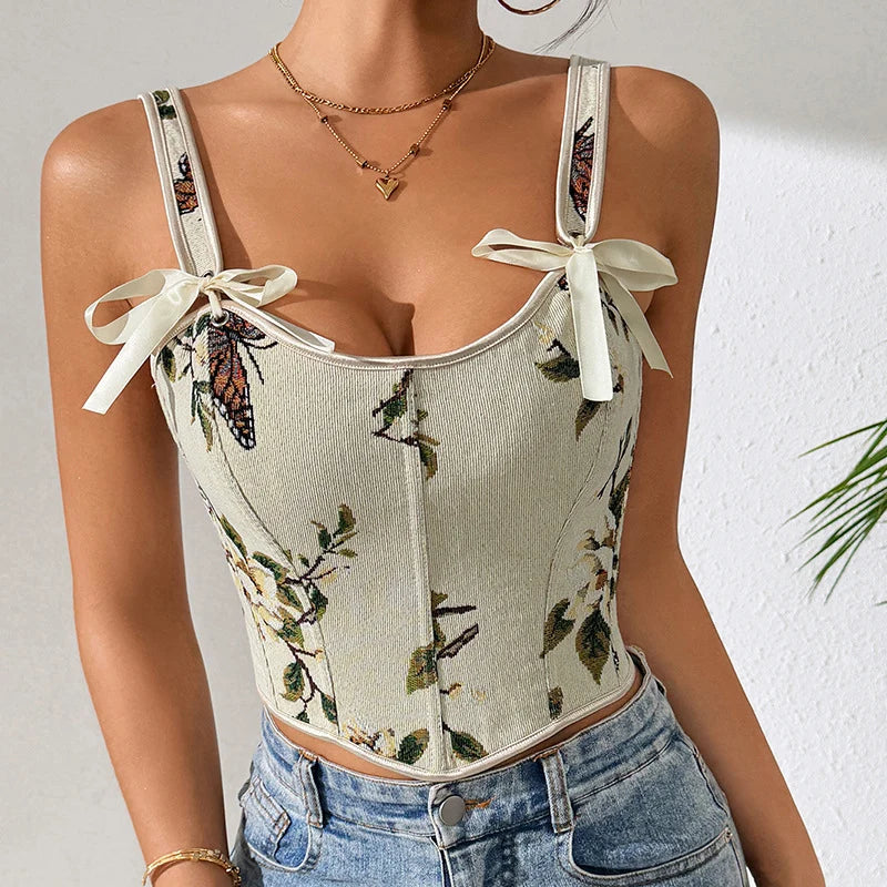 Gilet cintrée femme fleuri, bretelles à nouer. Ce haut chic est idéal pour une allure élégante au printemps.