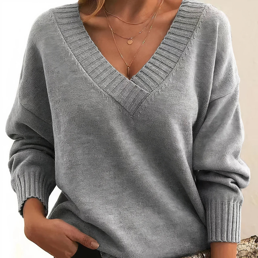 Pull femme tricot décontracté, col rond. Vêtement polyvalent et confortable pour automne, hiver, printemps.