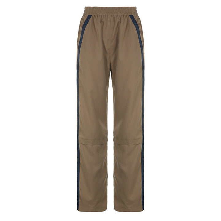 Pantalon jogger homme rétro pour un look streetwear branché. Rayures contrastées et coupe décontractée pour le confort.
