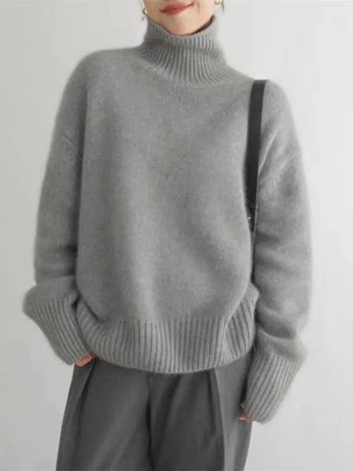 Pull chaud et confortable pour femme avec col roulé, en maille épaisse, essentiel pour l'hiver.
