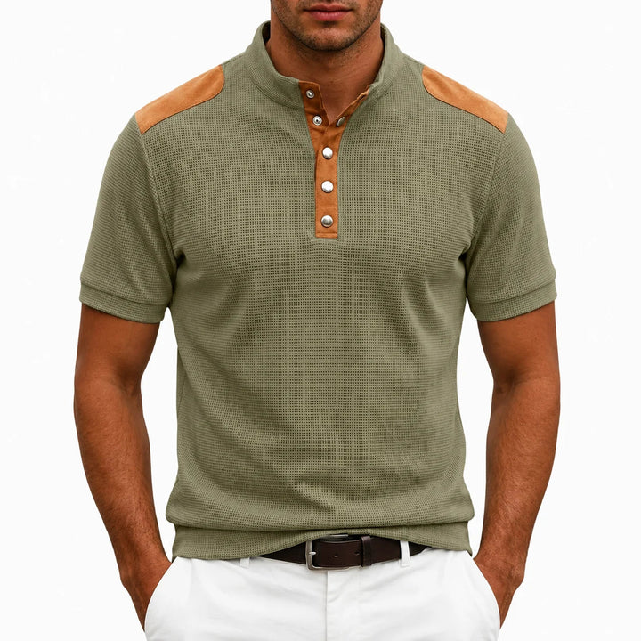 T-shirt homme décontracté à col montant boutonné. Style moderne et polyvalent avec panneaux contrastants. Haut printemps-été.
