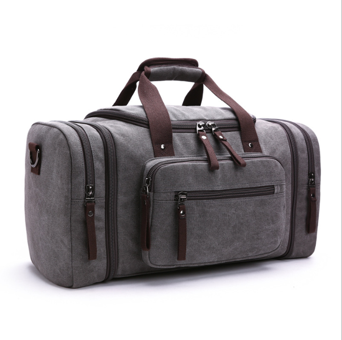 Sac de voyage homme grand format en toile robuste, idéal pour le weekend et les courtes escapades.