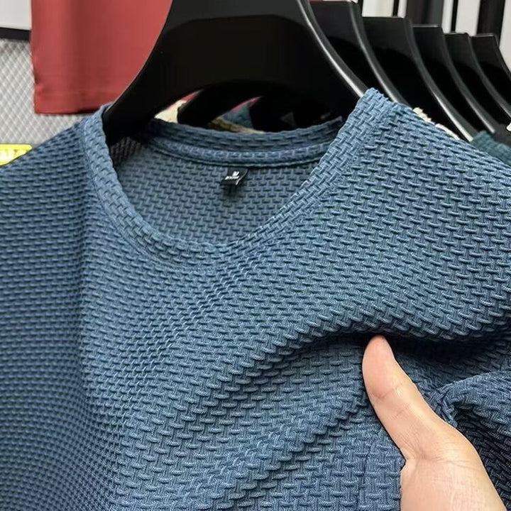 Chemise homme coupe slim à manches courtes style pull, motif carreaux, confortable et respirante pour le style décontracté.