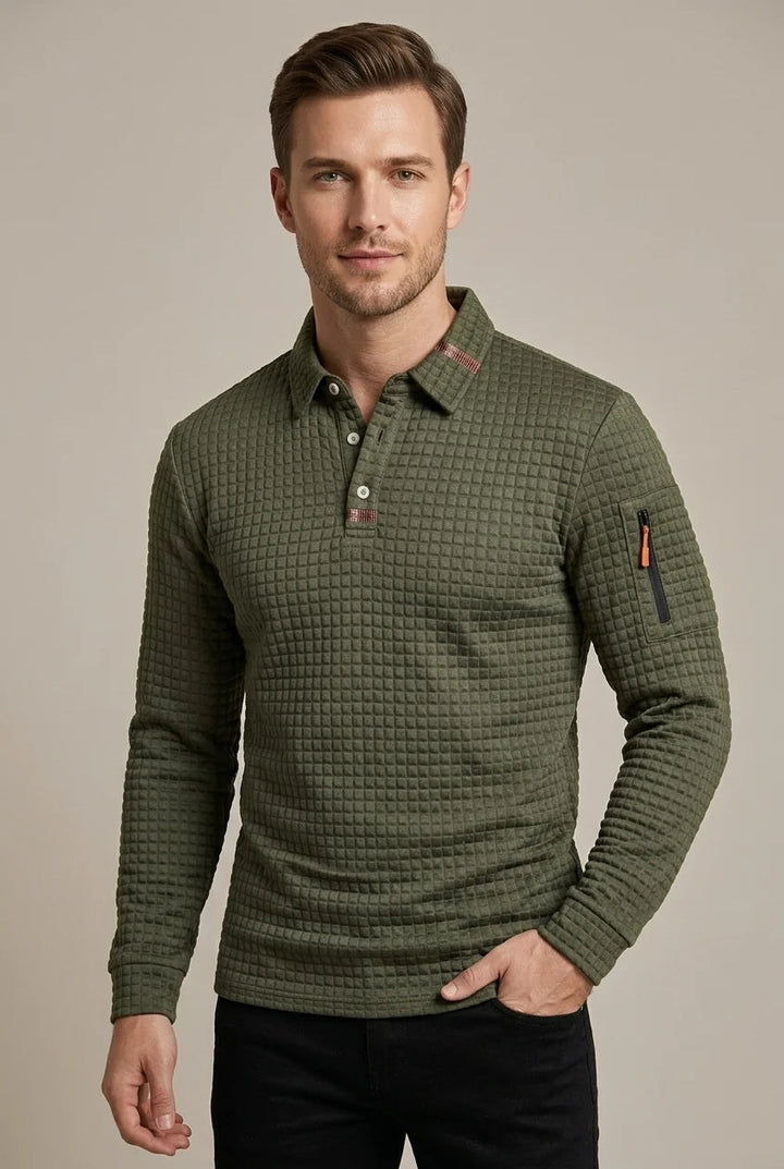 Polo homme à manches longues avec un motif damier unique et moderne. Parfait pour toutes occasions.