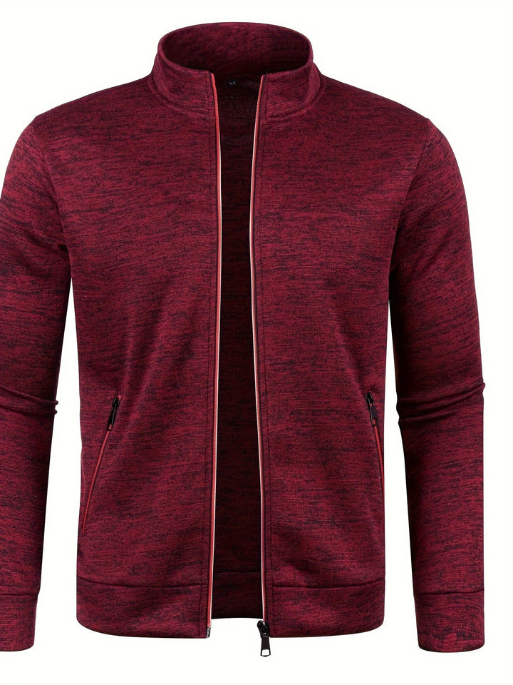 Veste masculine zippée à col montant. Confort moderne, coupe polyvalente, idéale pour le quotidien et les sorties urbaines.