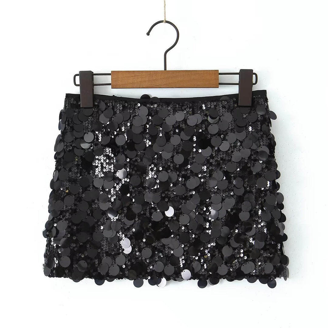 Jupe mini femme à sequins scintillants, idéale pour soirée festive et look glamour.