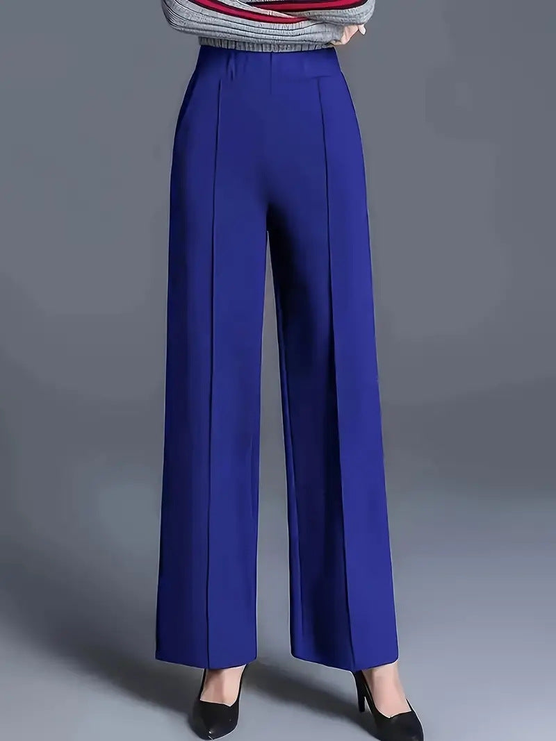 Pantalon droit femme noir, chic et confortable, parfait pour le bureau ou une sortie décontractée.