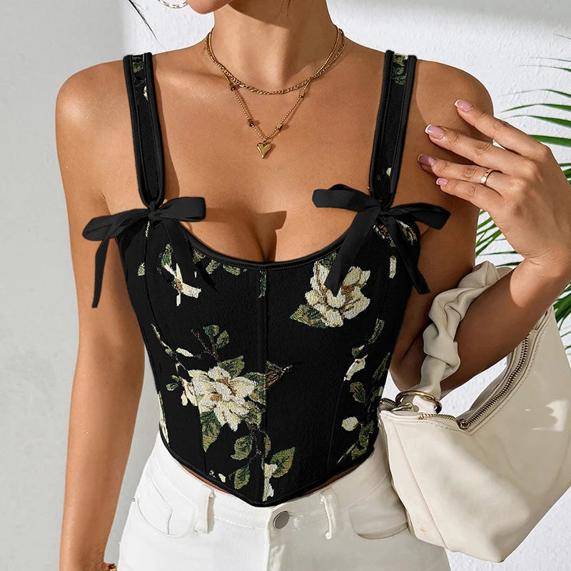 Débardeur femme fleuri vintage, coupe cintrée, bretelles à nouer. Un haut mode et élégant pour vos soirées.